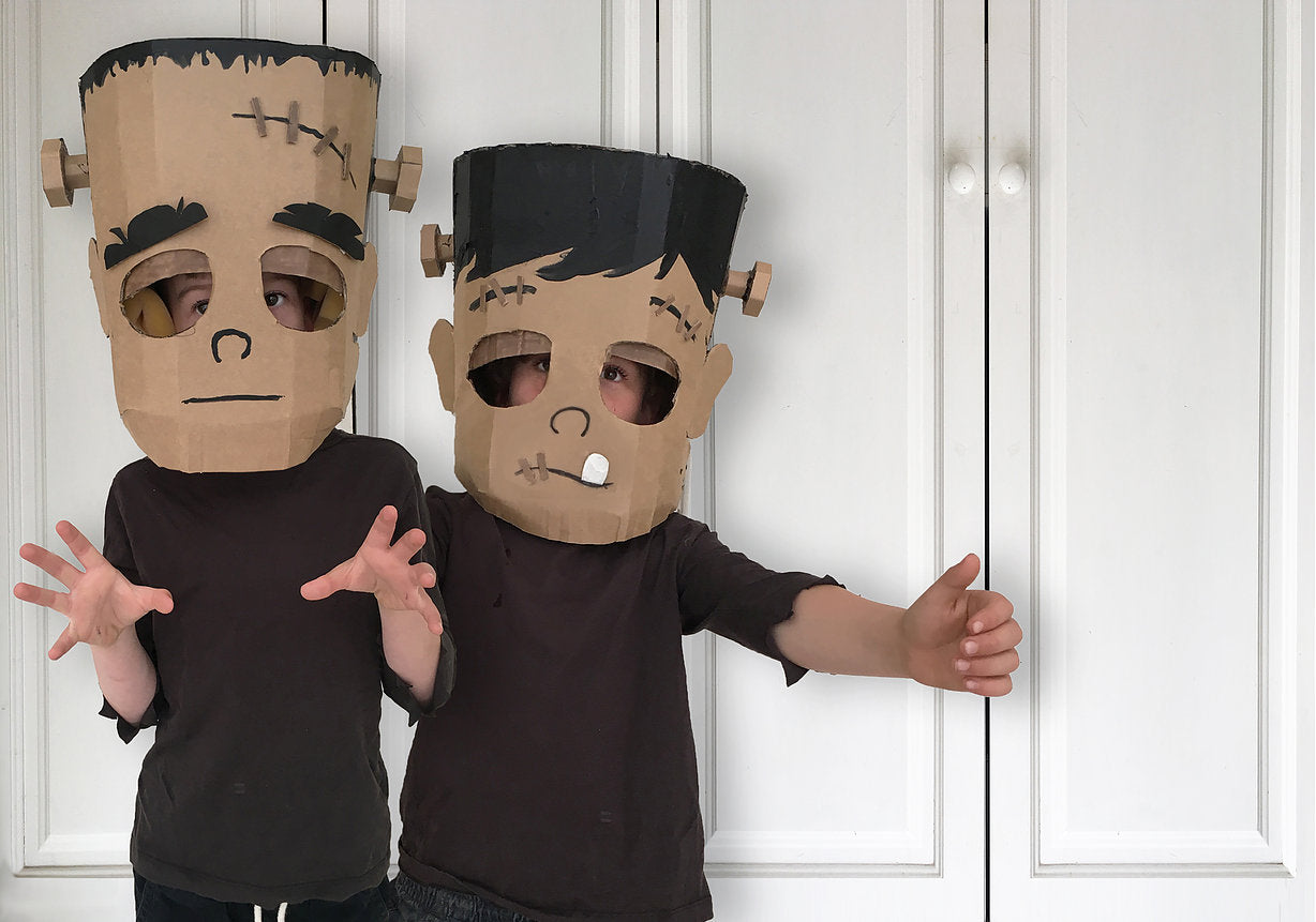 Two children wearing DIY Cardboard Frankenstein Monsters Costume
