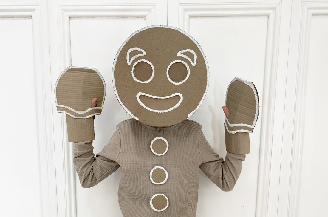 Child dressed up as a gingerbread man