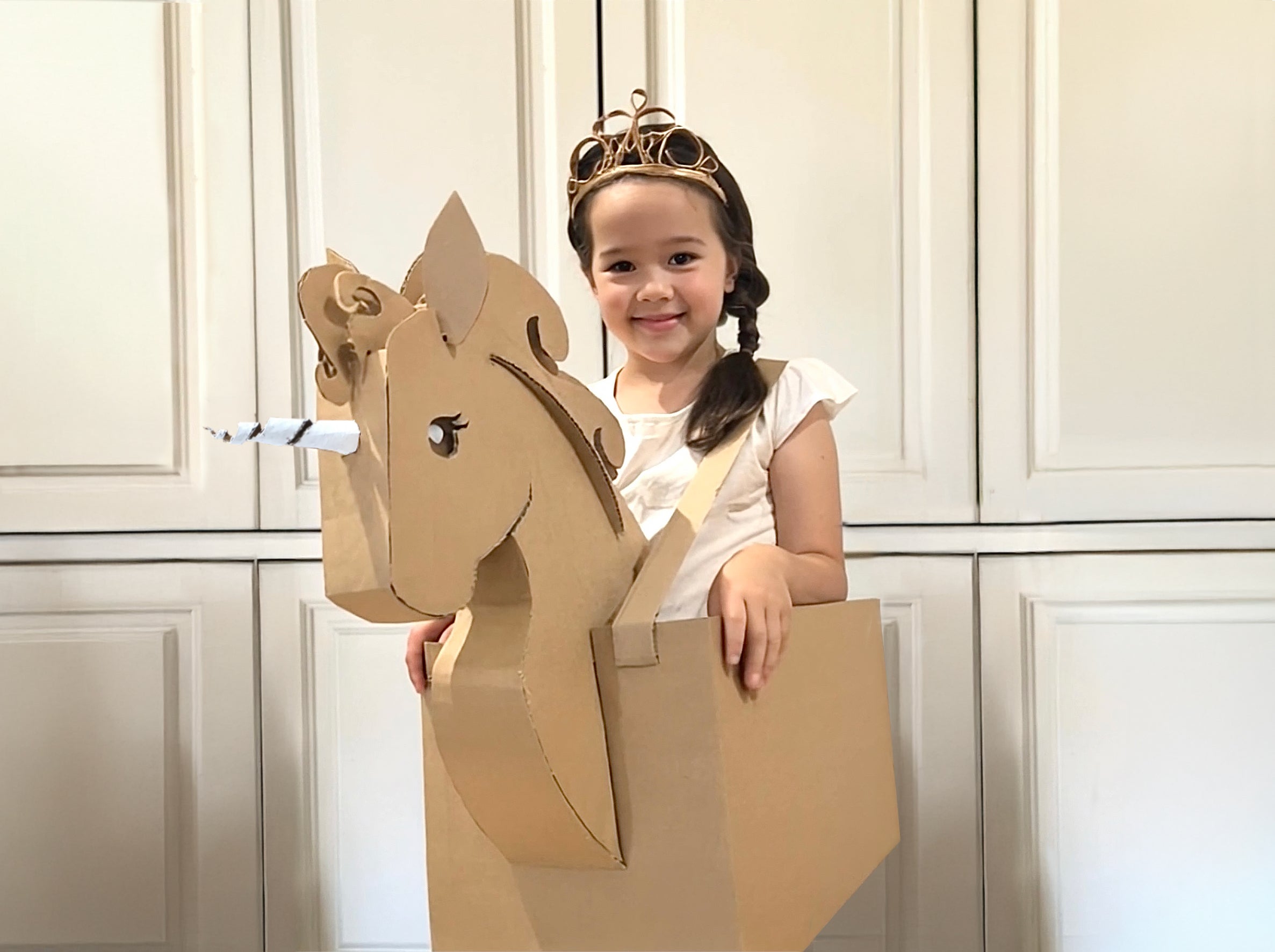 DIY Cardboard unicorn costume made from a cardboard box