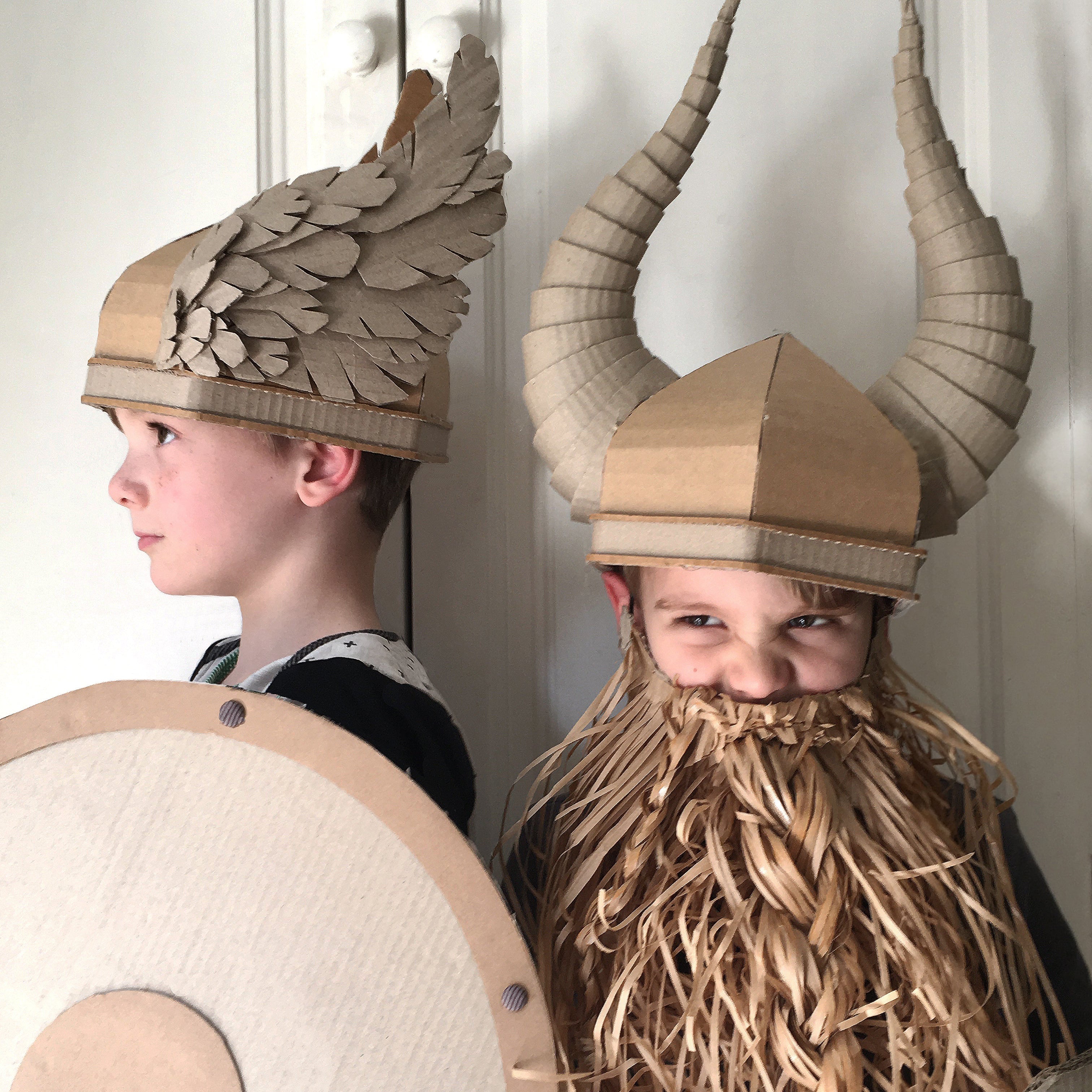 Cardboard viking Helmets with wings and horns.